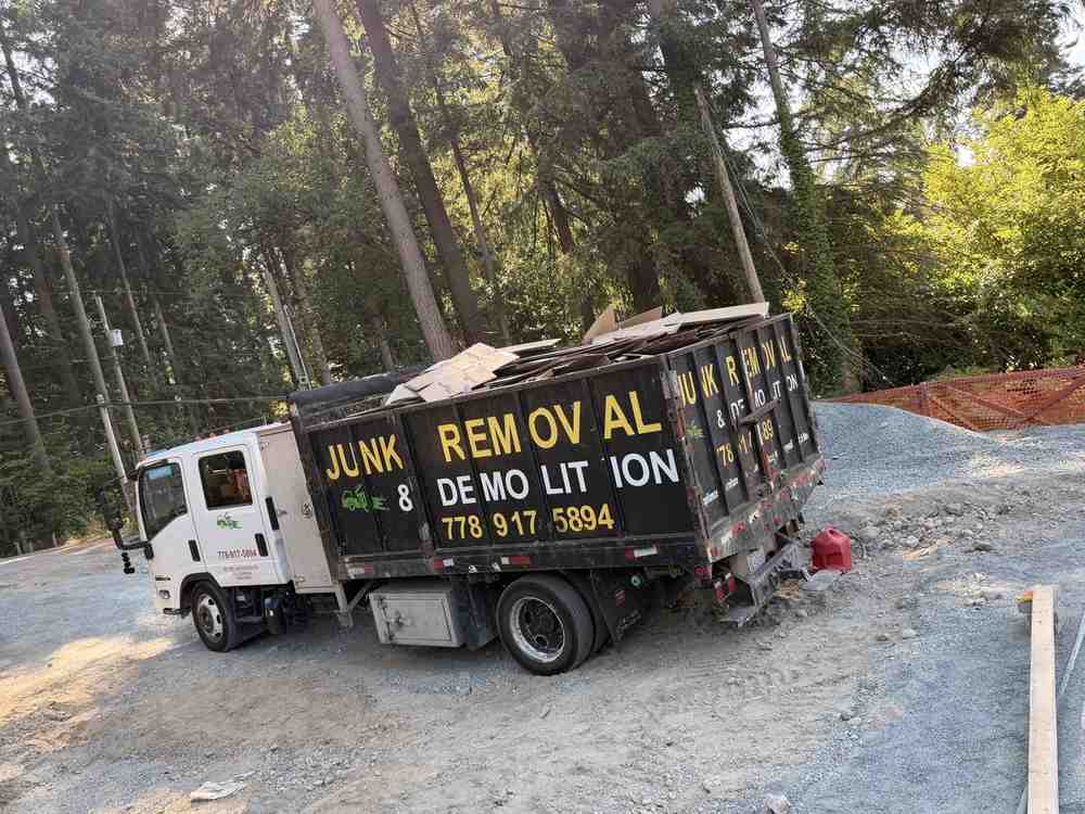 Redtree junk removal and demolition truck parked at a job site